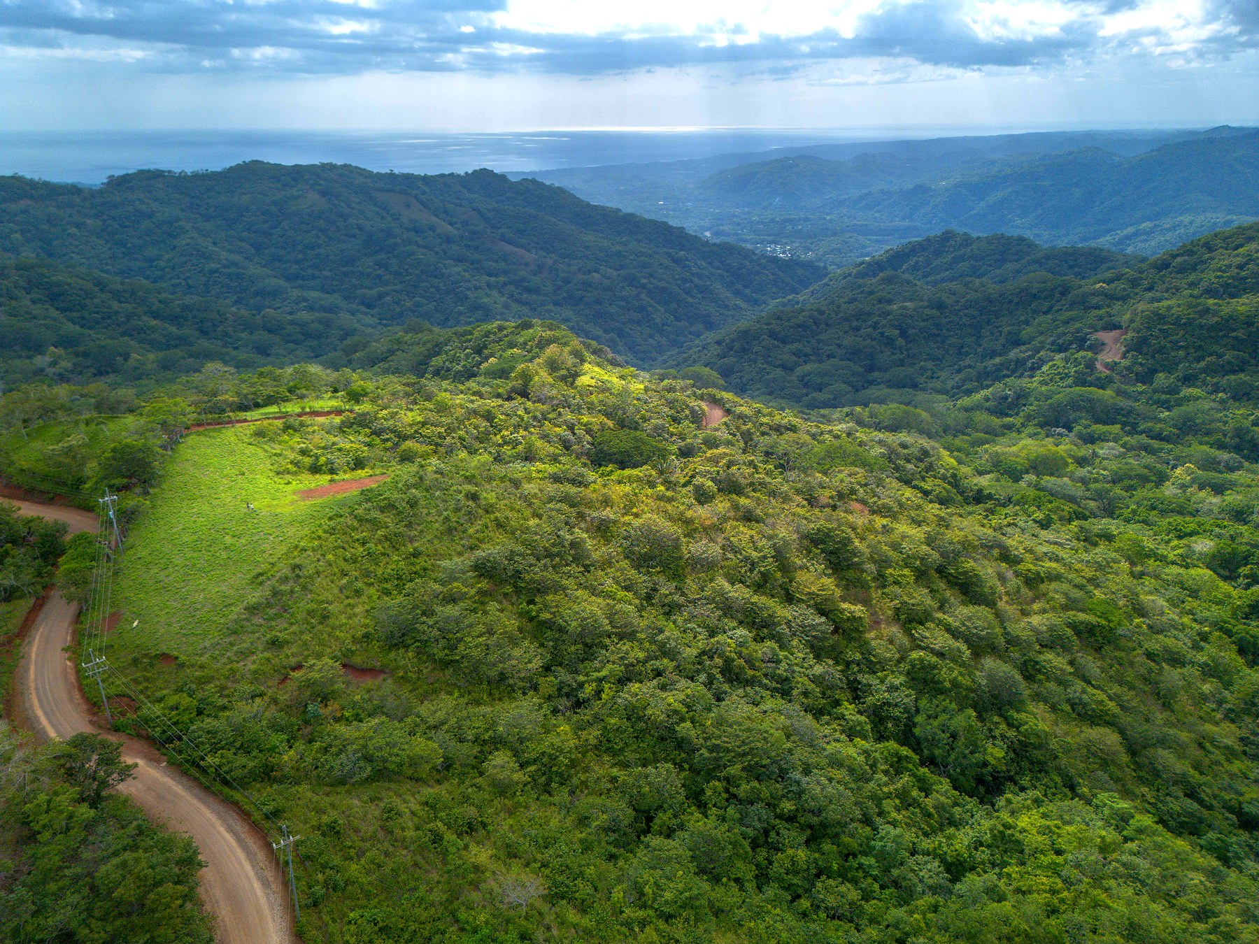 Finca 1 — aerial with ocean and road
